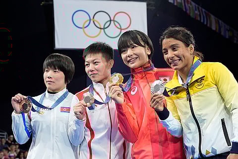 Paris Olympics women's freestyle 53kg wrestling: North Korea's Hyo Gyong Choe, Cnina's Qianyu Pang, bronze, Japan's Akari Fujinami, gold, Ecuador's Lucia Yamileth Yepez Guzman, silver